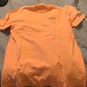 Medium peach orange Patagonia t shirt